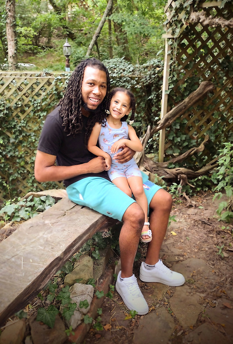 Jeremiah with his daughter.