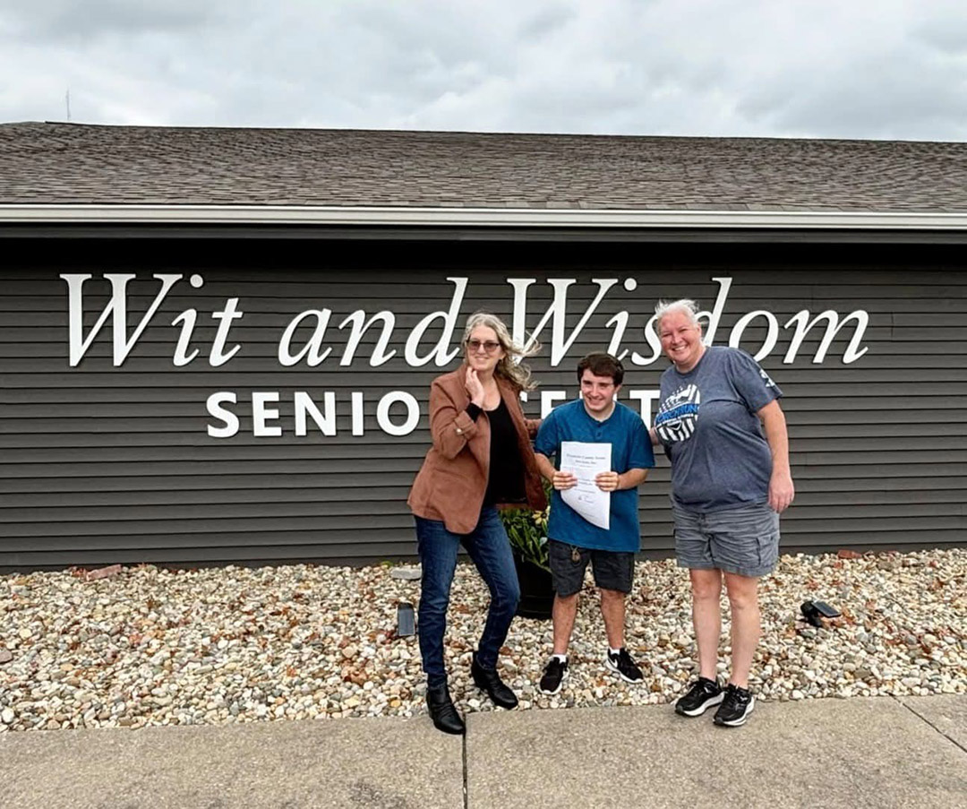 Spencer Metro, center, at Franklin County Senior Services Wit and Wisdom Center.