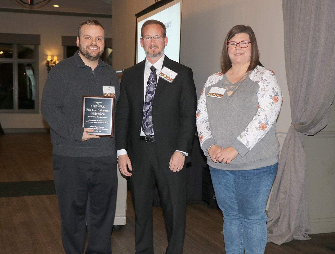 SIWDB Chair Terance Henry honors SIWDB members who have given many years of dedicated service to the board.