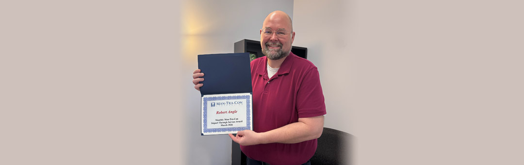 Robert Angle receives service award from Man-Tra-Con