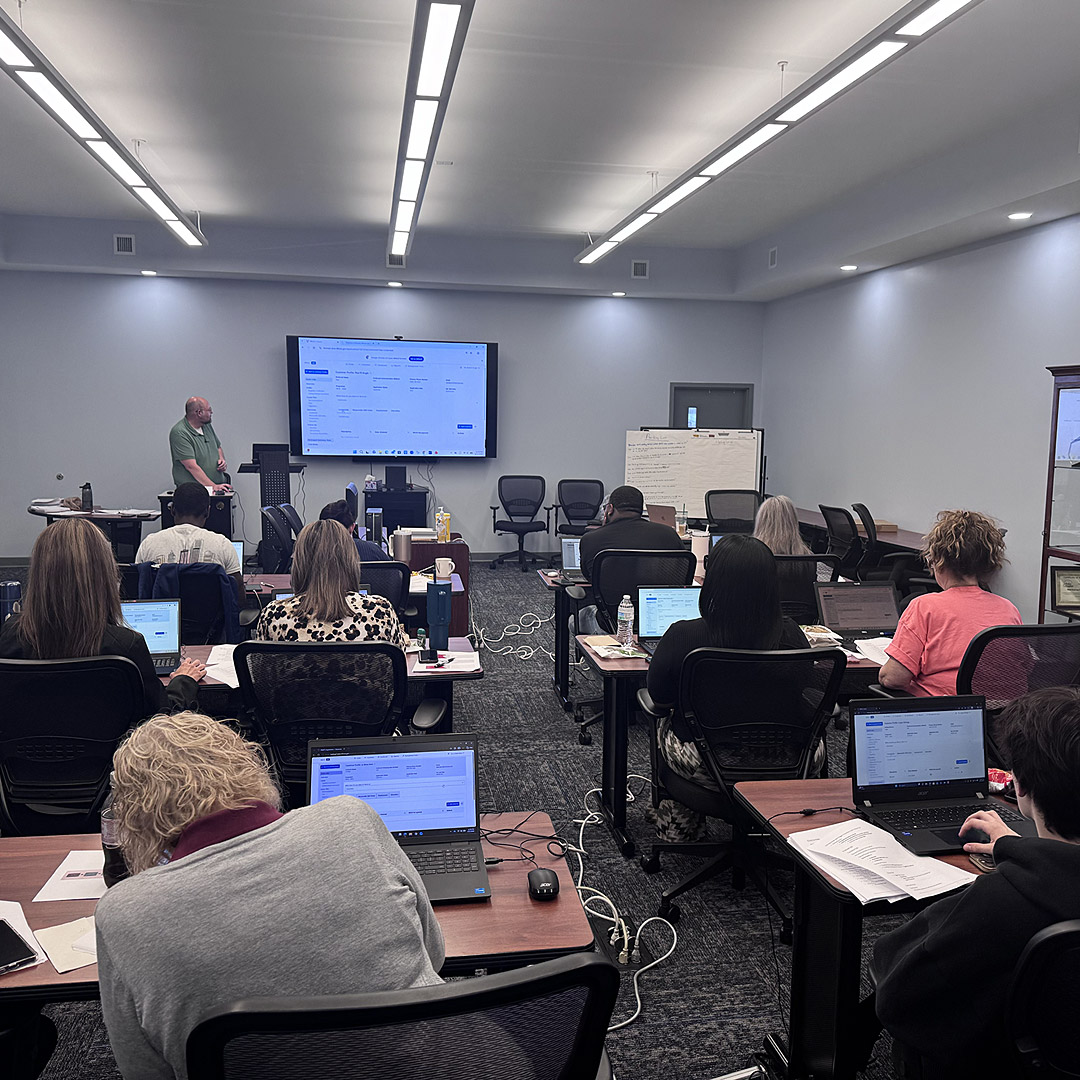 Re-entry & Integration Career Specialist Robert Angle welcomes Man-Tra-Con staff to the training.