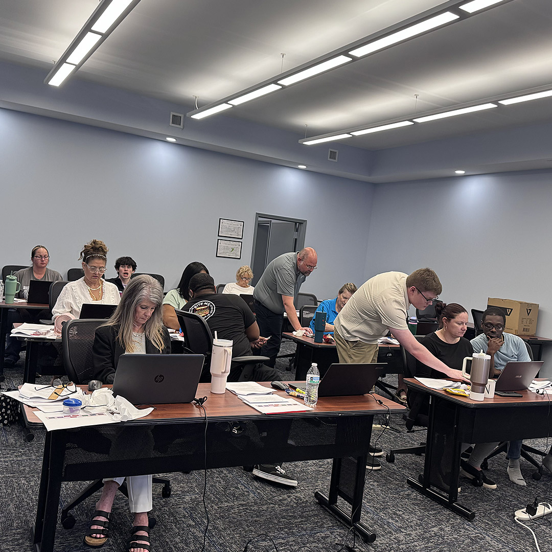 Re-entry & Integration Career Specialist Robert Angle explains elements of the new IWDS 2.0 software to Man-Tra-Con staff.