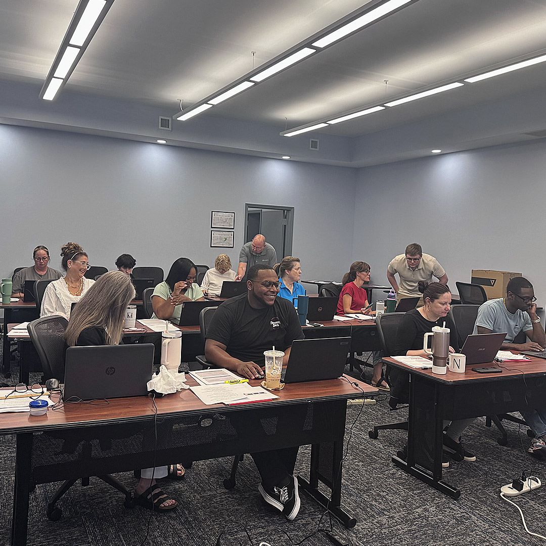 Re-entry & Integration Career Specialist Robert Angle explains elements of the new IWDS 2.0 software to Man-Tra-Con staff.