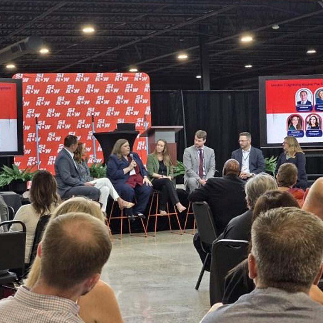 Man-Tra-Con CEO Stephanie Robinson (center) speaks with panel members during "The Future of Economic Development: The Real Truth" lightning round panel discussion.