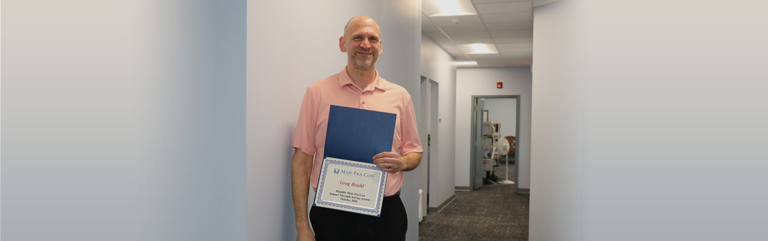 Greg Bouhl wins service award.