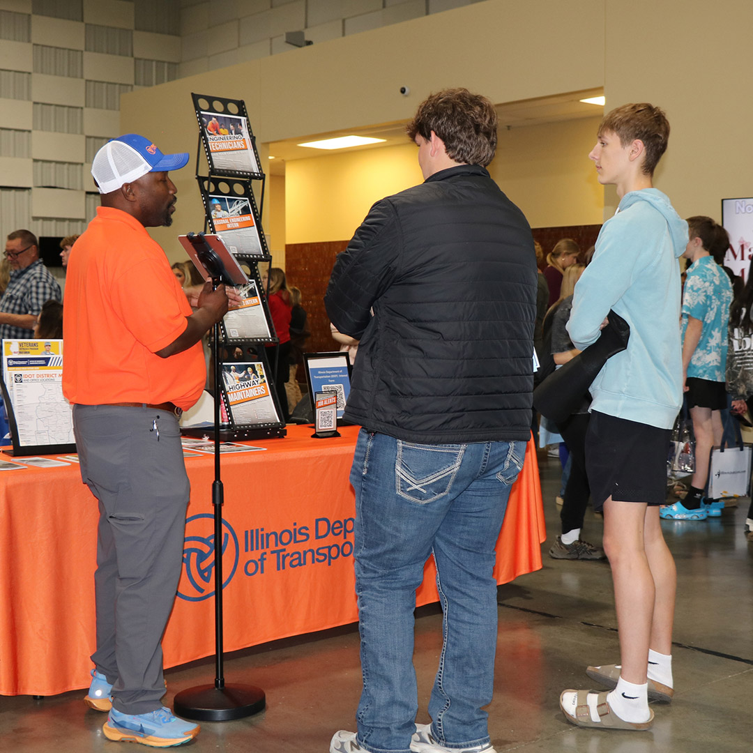 Students visit the Illinois Department of Transportation table.